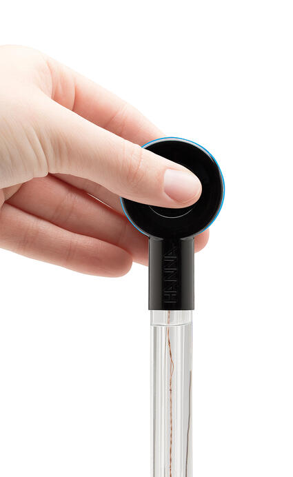 Hand holding Halo wireless pH meter